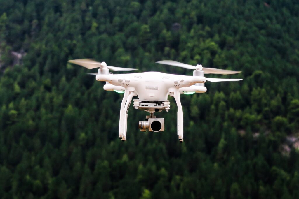 Drone monitoring crops in a smart farming field using AI technology